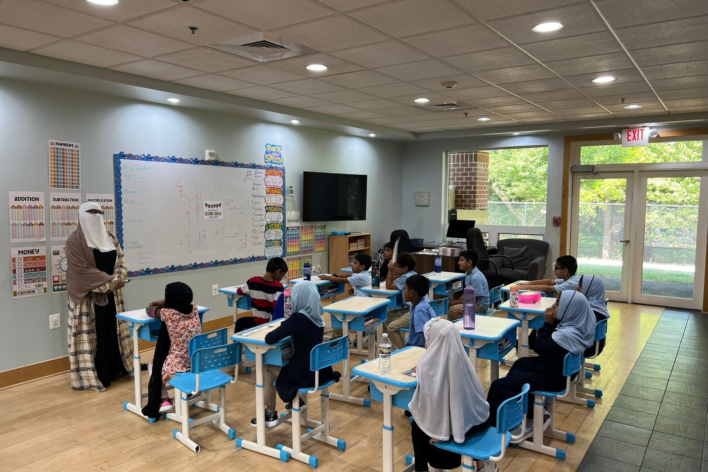 Oceans Academy elementary students working at their desks in class